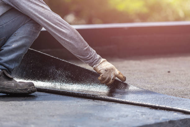 Professional Basement Waterproofing technician working in West Lebanon, IN